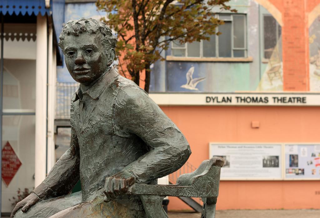 A statue of Welsh poet Dylan Thomas outside the Dylan Thomas Theatre in Swansea, Wales.