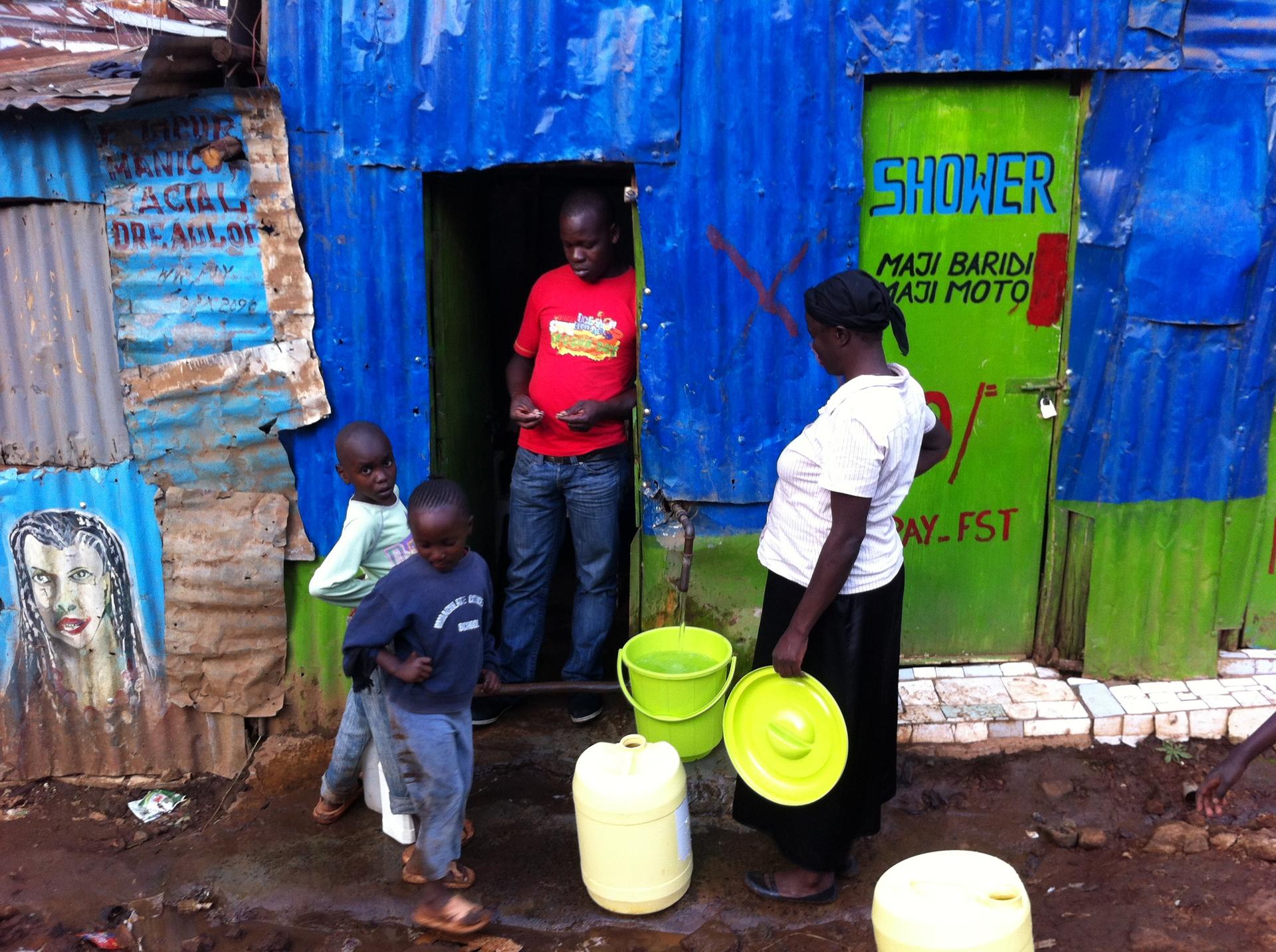 A water merchant in Nairobi sells to the city's poor.
