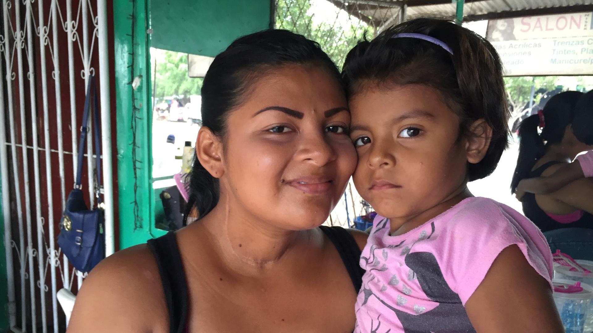 Franci Machado brings her four-year-old daughter to work every day because she can't afford childcare. She says if she died because she couldn't get chemotherapy to treat her cancer no one would take care of her two children.