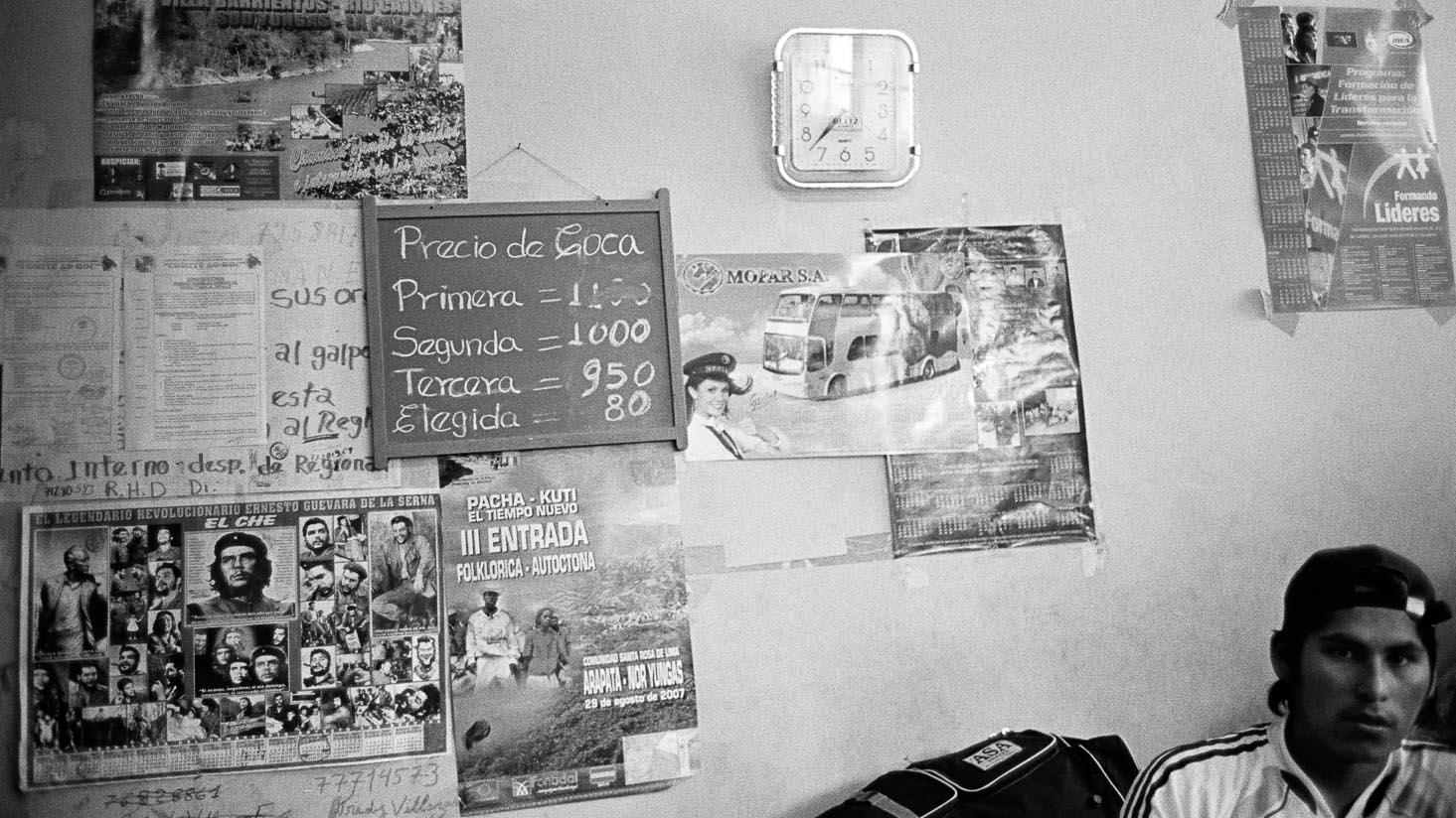 A chalkboard lists the day's prices for coca - according to the quality of the leaves - in the Villa Fátima legal coca market in La Paz.