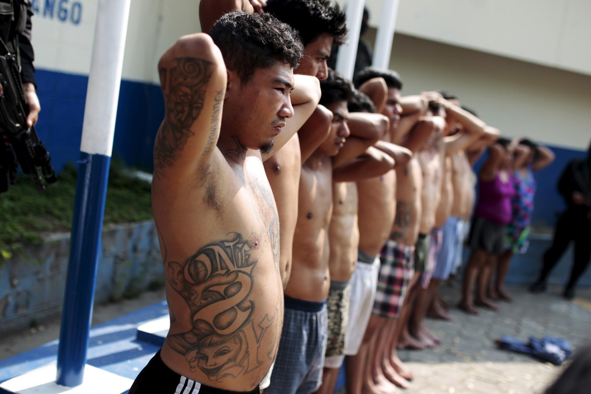13 suspected members of the 18th street gang are presented to the media after being arrested by the police in Soyapango, El Salvador in March.