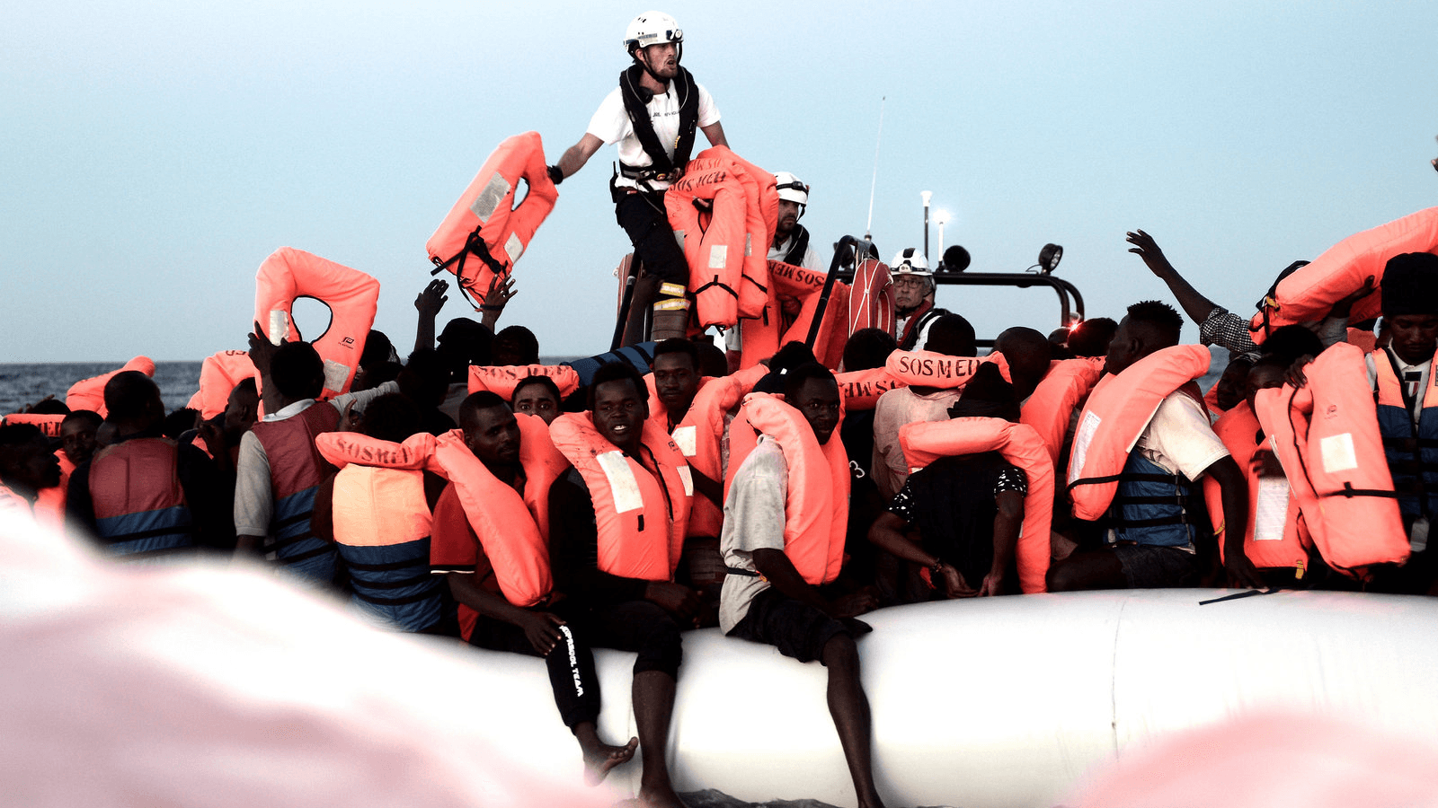 refugees are rescued on the Mediterranean Sea