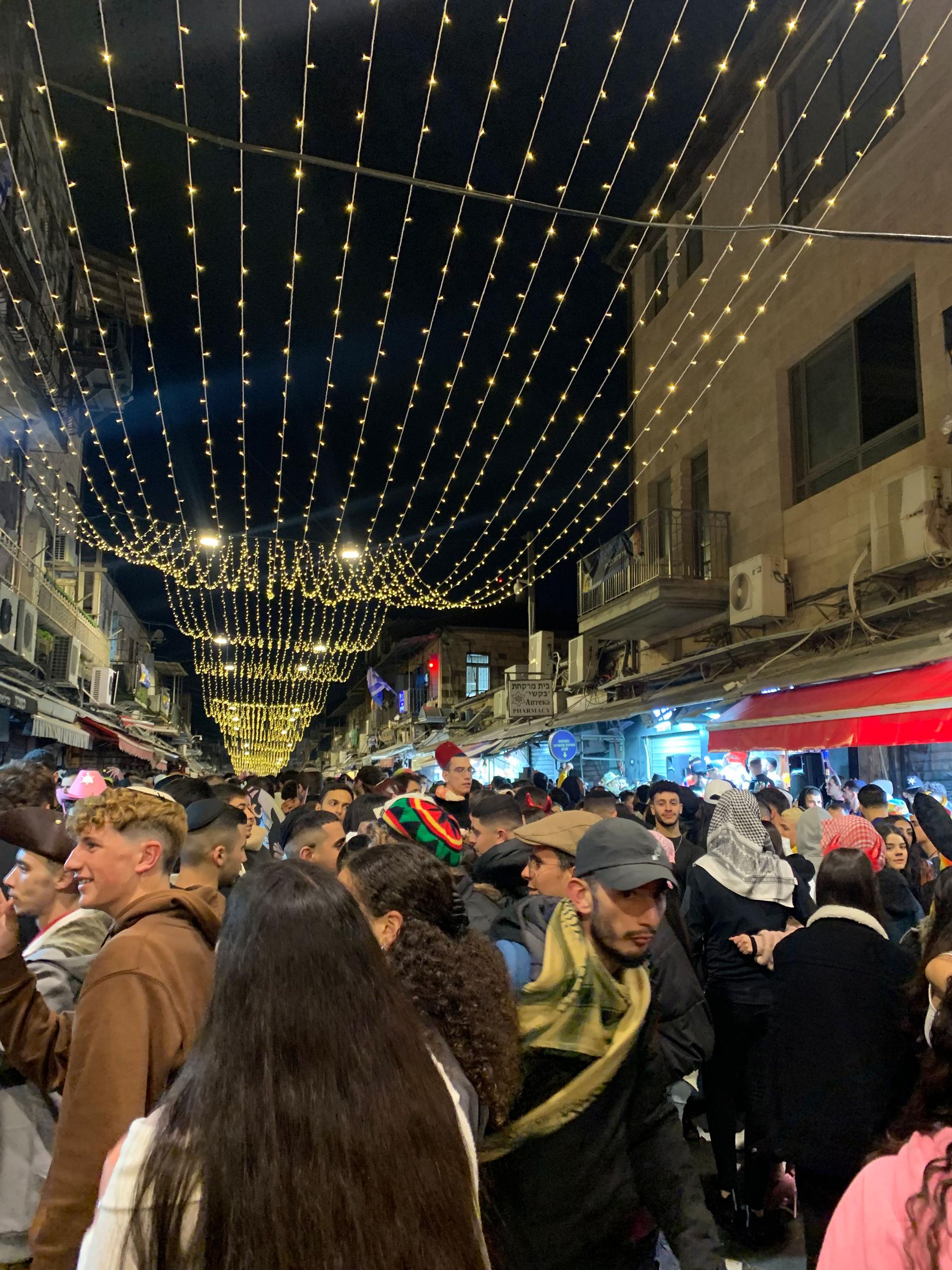 Mahane Yehuda Market in Jerusalem, on the evening of Shushan Purim.