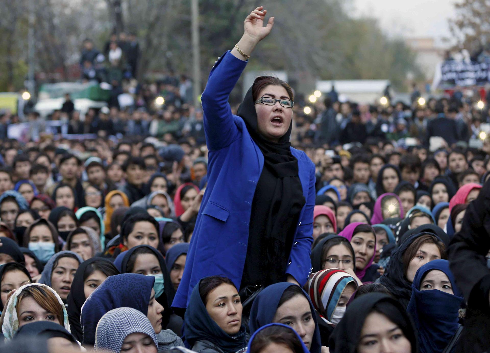 Women chant slogans during a protest in Kabul, Afghanistan